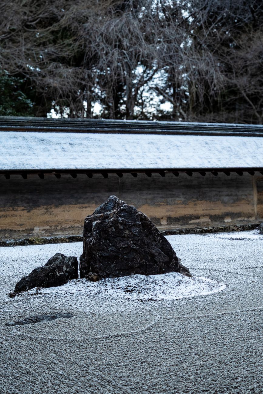 A serene stone zen garden courtyard in Kyoto